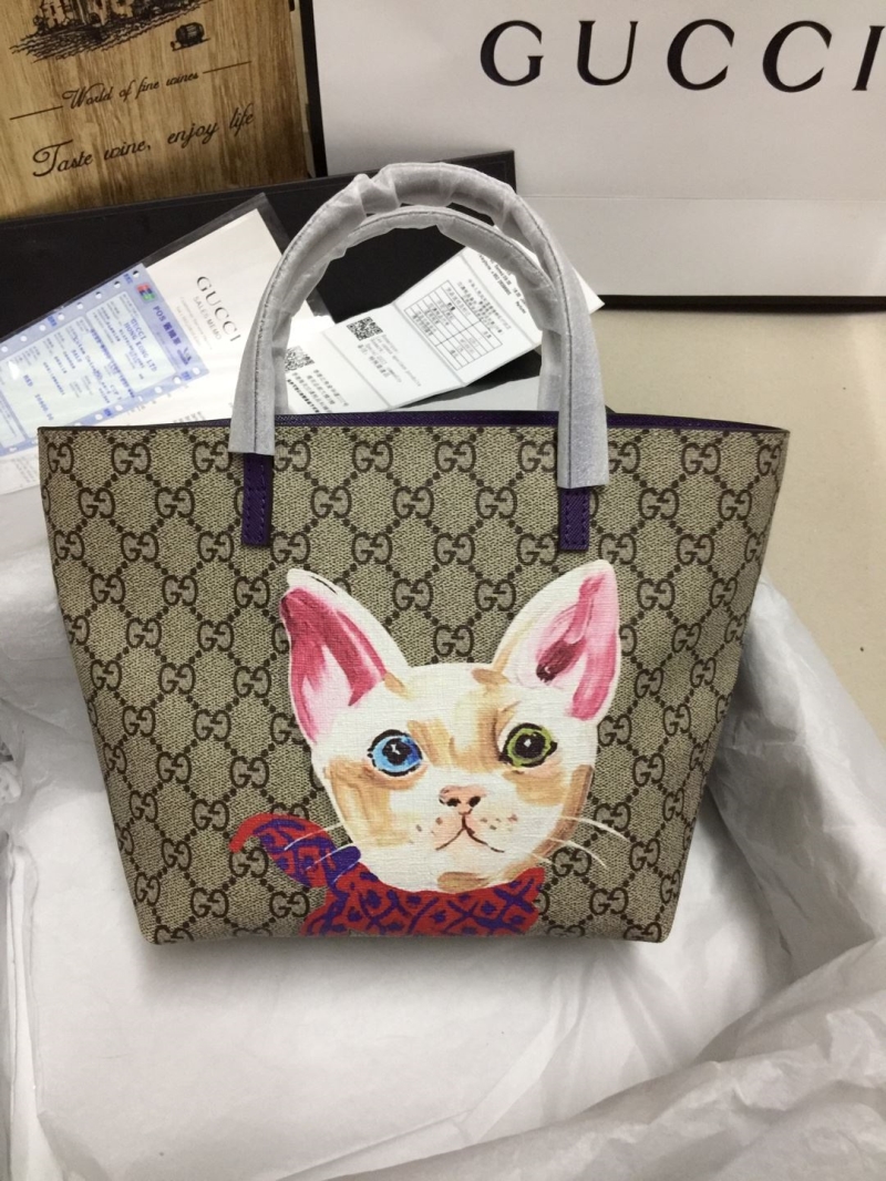 G*u*i shopping bags